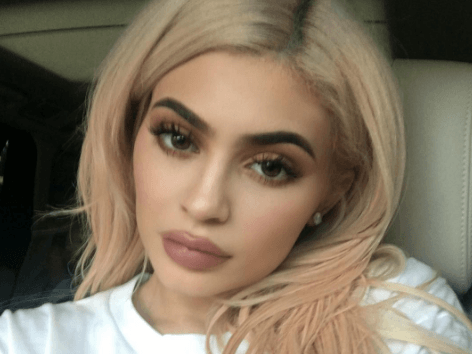 Kylie Jenner poses completely naked in nothing but paint as she leaves nothing to the 