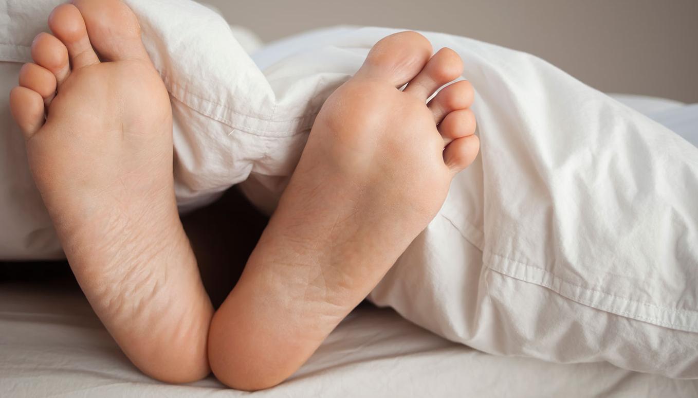 Here’s why it feels so good when you sleep with one foot out of a